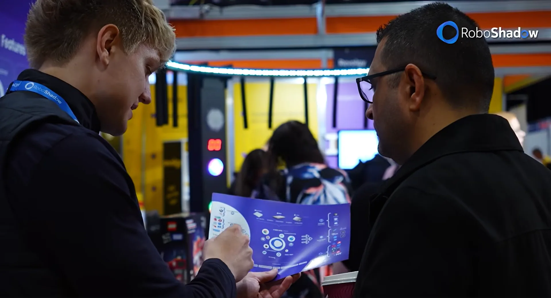 RoboShadow team at a cybersecurity trade show